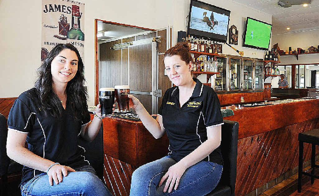 Celebrating the new-look Shamrock Hotel, staff members Grace Maguire and Louise Hawkins toast with a pint of Guinness and Kilkenny. Celebrating the new-look Shamrock Hotel, staff members Grace Maguire and Louise Hawkins toast with a pint of Guinness and Kilkenny.